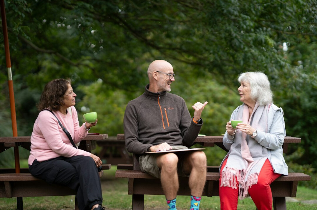 elderly friends chatting after workout