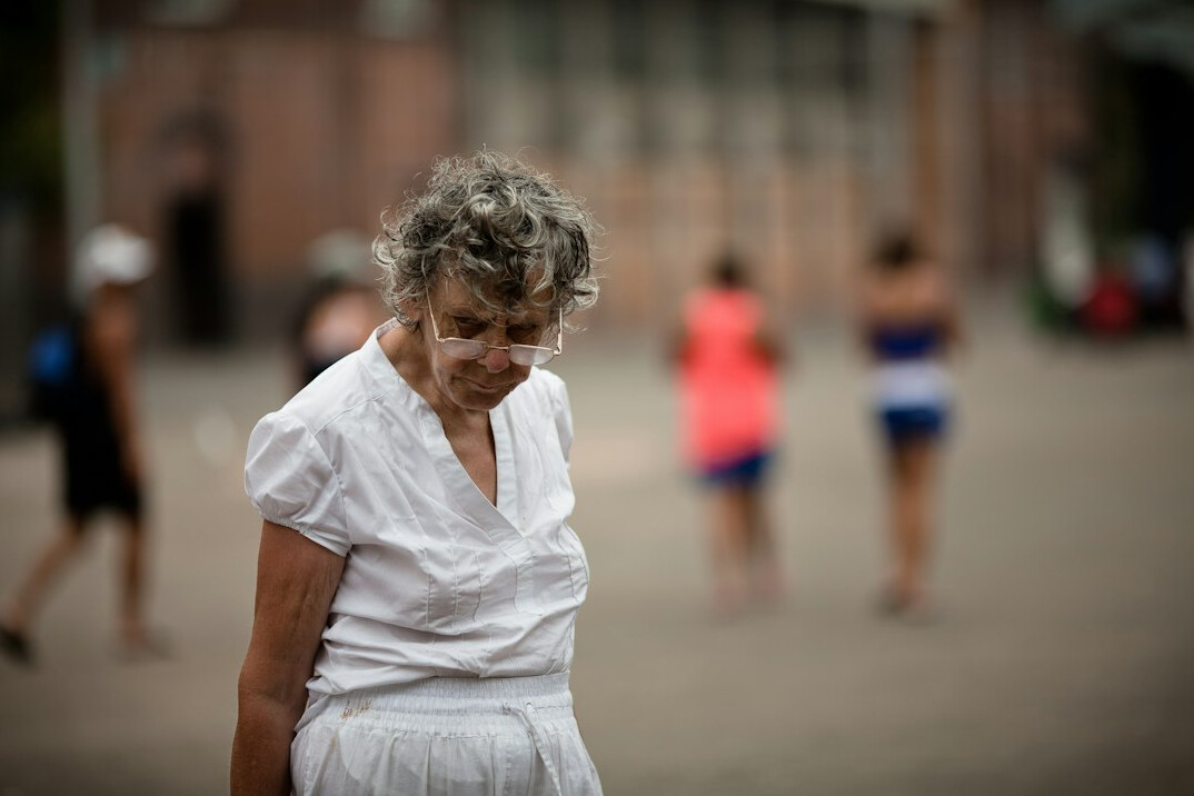 Portrait of an active senior woman with curly grey hair