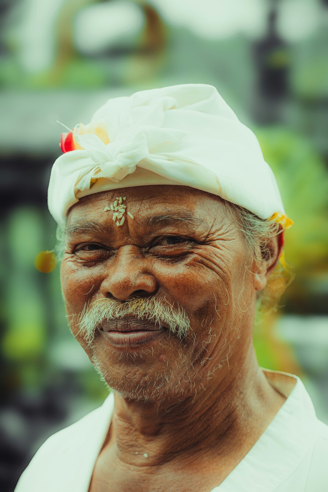 Portrait of a smiling senior man with white hair