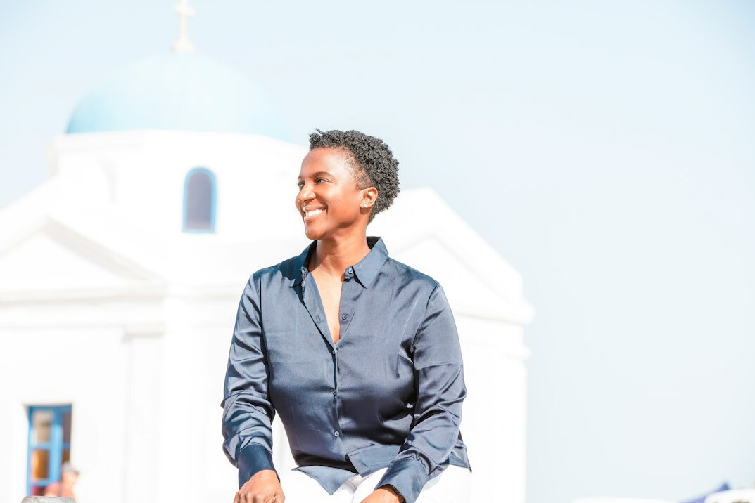 Portrait of a smiling senior woman with short grey hair