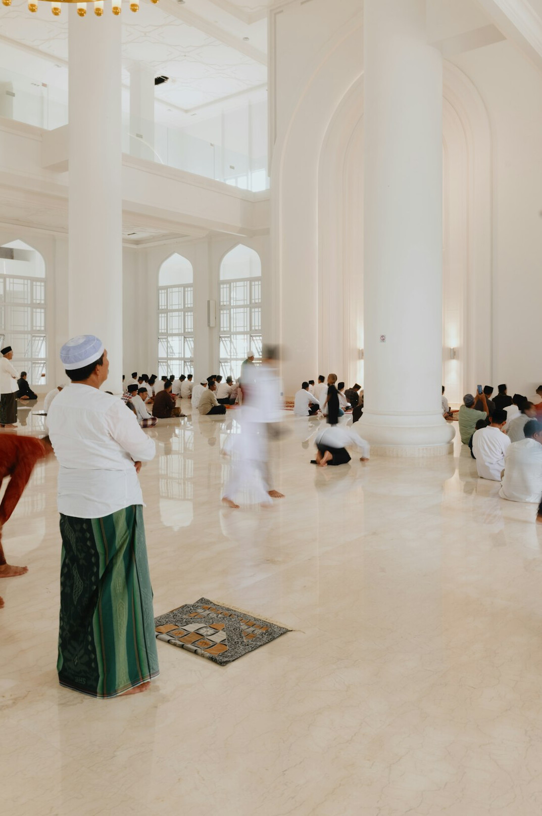 Senior couples ballroom dancing in a bright hall